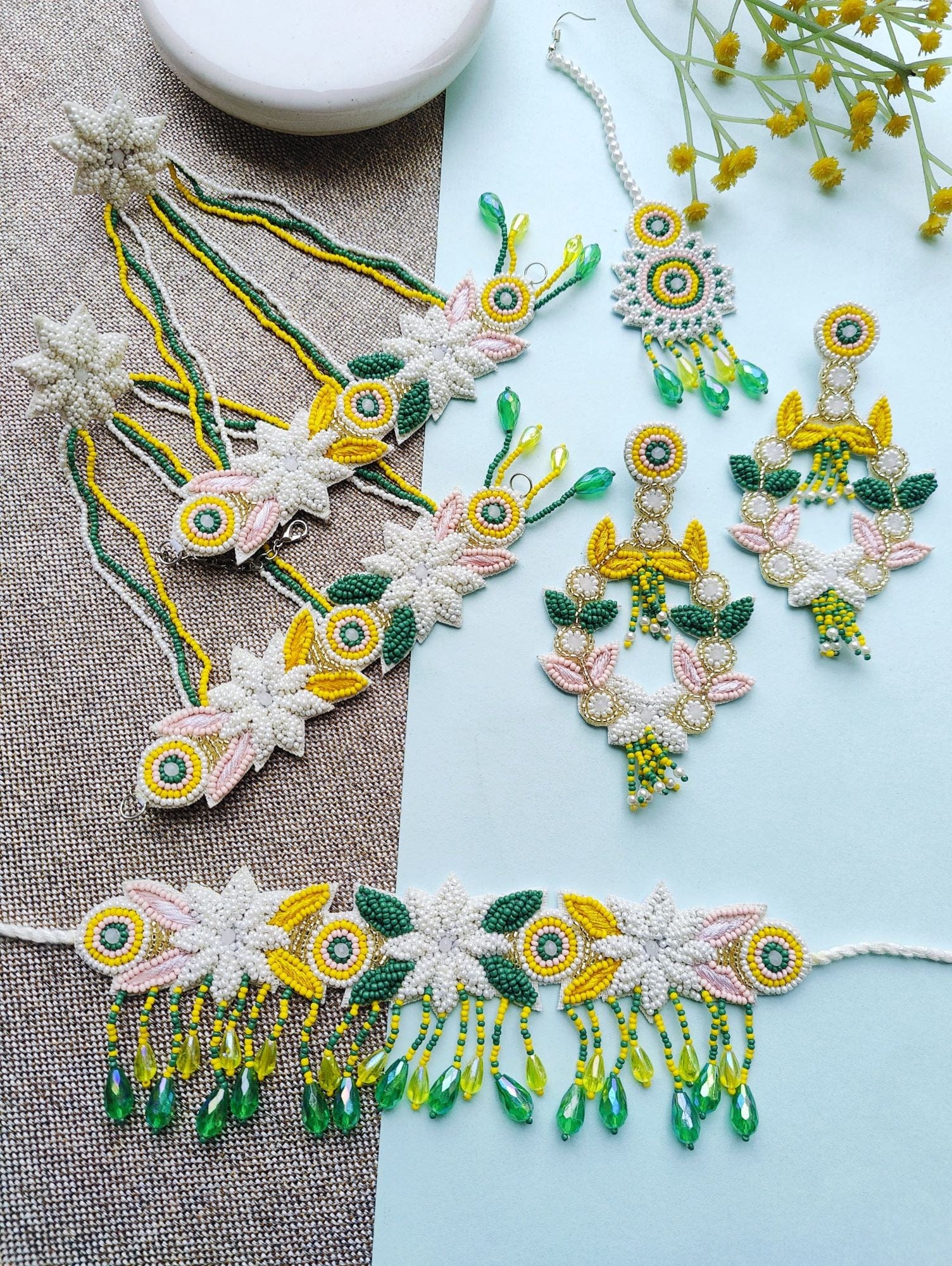 Handmade White Floral Beaded Haldi Jewellery Set with Green Drops